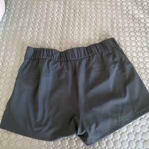 2prs of Lululemon shorts siz 12 - dark green, blue